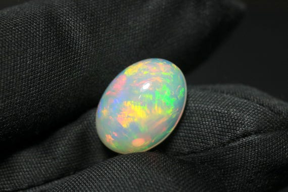5.00 CT Ethiopian Opal Cabochon: AAA Grade Oval Gemstone, 14x10.40mm