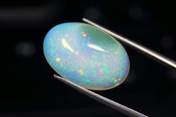AAA Ethiopian Welo Opal Cabochon: 11.20 CT Oval Gemstone