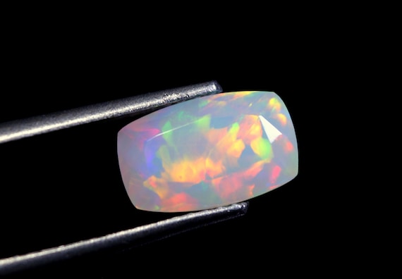 Rainbow Ethiopian Opal Gemstone: 1.40 CT Cushion Cut, Galaxy Fire