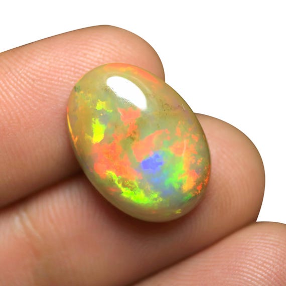7.25 CT Oval Welo Opal Cabochon: Flashy Ethiopian Gemstone (18.50x13.25x6.10 MM)