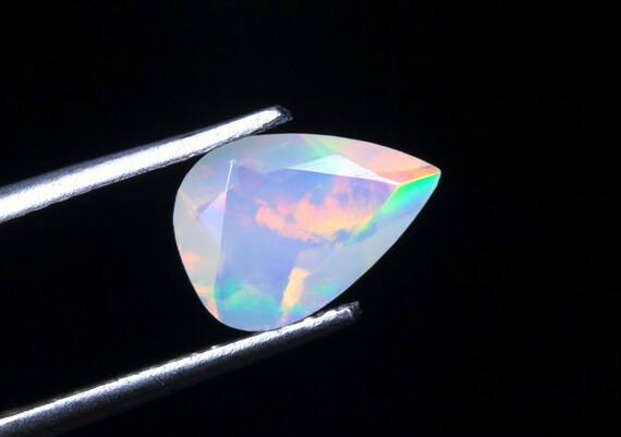 Natural Ethiopian Opal Pear Gemstone: Rainbow Galaxy Fire (0.85 CT)
