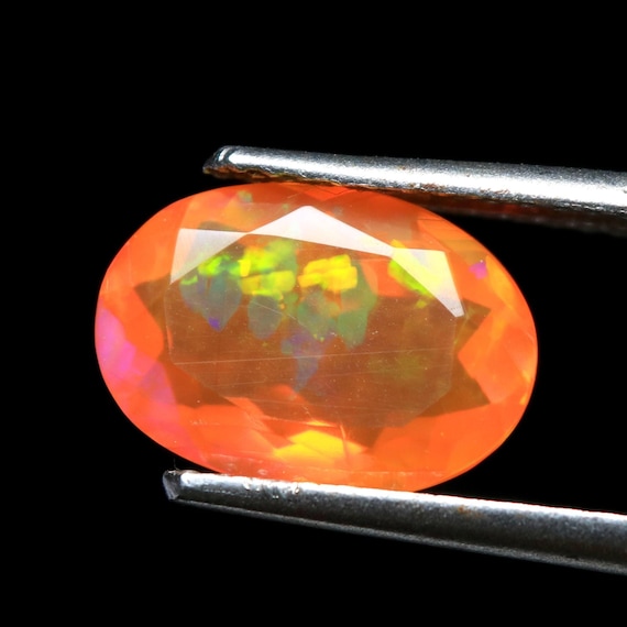 AAA Orange Ethiopian Opal: Faceted Oval Welo Opal, 1.50 CT