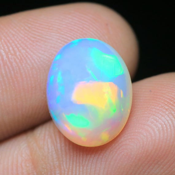 AAA Grade Ethiopian Opal Cabochon, Natural Multi Fire White Opal (14x11.30x7.50 MM)