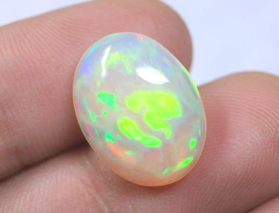 Oval Honeycomb Ethiopian Opal Cabochon: 7.25 Carat Natural Play of Color Opal For Jewelry