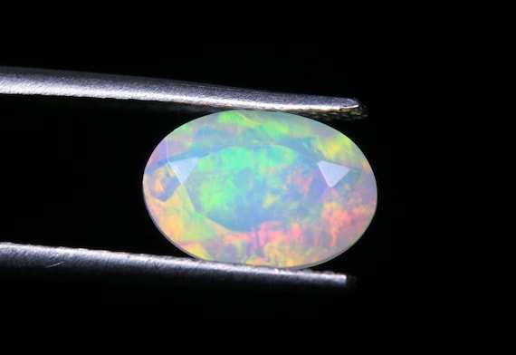 Natural Ethiopian Opal Gemstone: Oval Shape, 1.00 CT Welo Loose Stone (9x6x4 MM)
