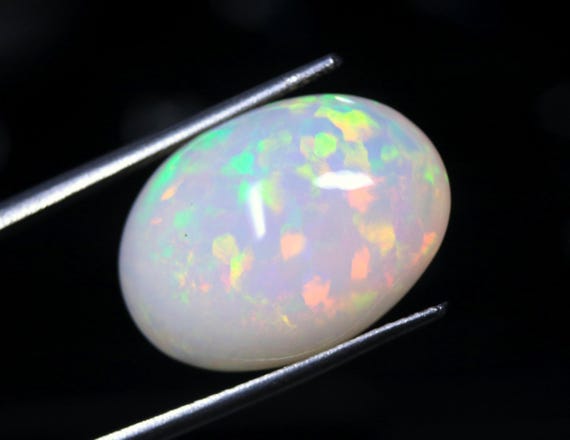 Welo Opal Cabochon: 11.00 CT Oval Ethiopian Gemstone