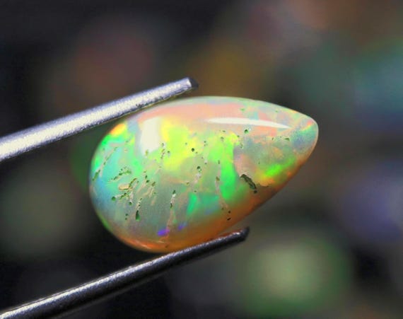 Welo Opal Gemstone, 1.40 CT Ethiopian Opal Pear Cabochon