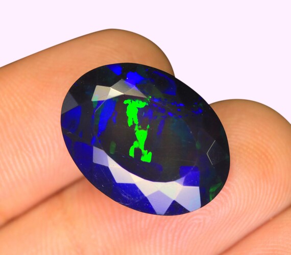 10.10 CT Faceted Ethiopian Black Opal, Oval Welo Opal Gemstone (19x14.50x10 MM)