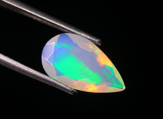 Faceted Ethiopian Welo Opal: 1.80 CT Teardrop Gemstone, 12.60x7.40x4.20 MM