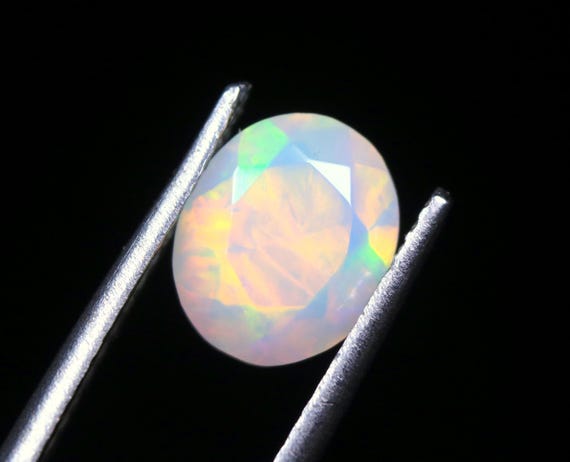 Natural Ethiopian Opal Gemstone: 0.85 CT Oval Welo Loose Stone For Jewelry