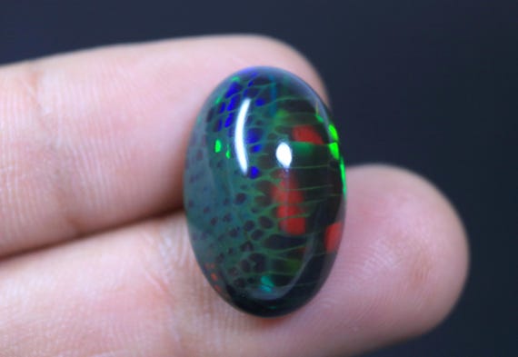 AAA Grade Ethiopian Honeycomb Black Opal Oval Cabochon, 12.70 Carat Rainbow Opal Loose Gemstone