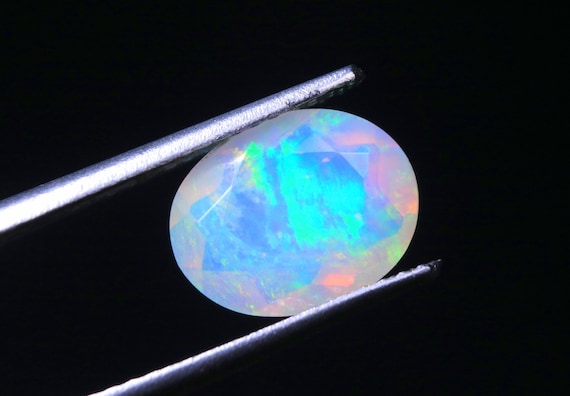 Ethiopian White Opal Gemstone, Oval Shape Faceted Loose Stone (9.60x7.50x4.60 MM)