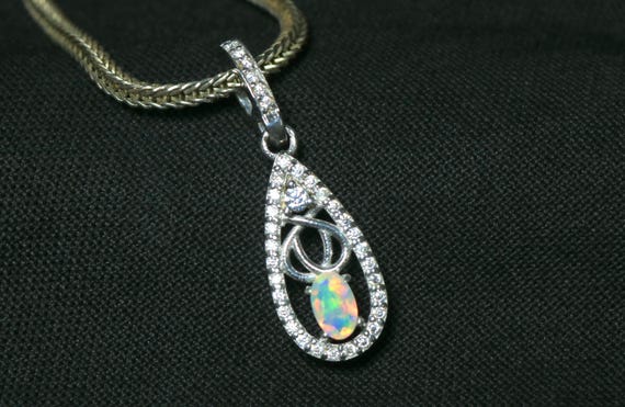 Ethiopian Opal Pendant: Sterling Silver Necklace, Moissanite Accents