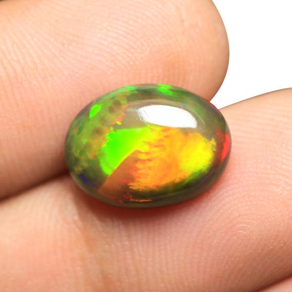 Natural Black Opal Cabochon, AAA Grade Ethiopian Welo Opal Gemstone (14x10.50x5.20 MM)