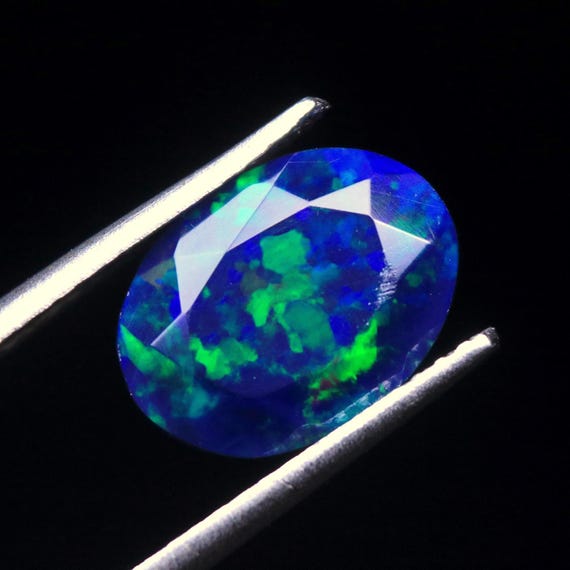 Ethiopian Opal Faceted Gemstone: Galaxy Fire Oval Stone Jewelry Making, (1.60 CT, 10.60x8x4.60 MM)