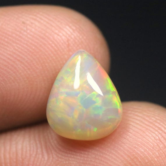Ethiopian Welo Opal Cabochon: 2.10 CT Pear Multi Fire Gemstone, 11x9x4.5 MM