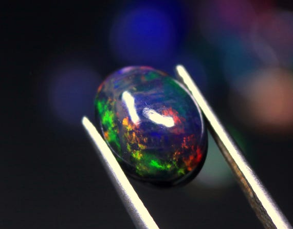 AAA Black Opal Cabochon: 2.55 CT Oval Ethiopian Gemstone