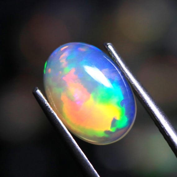 Ethiopian Welo Opal Gemstone, 1.70 CT Oval Cabochon
