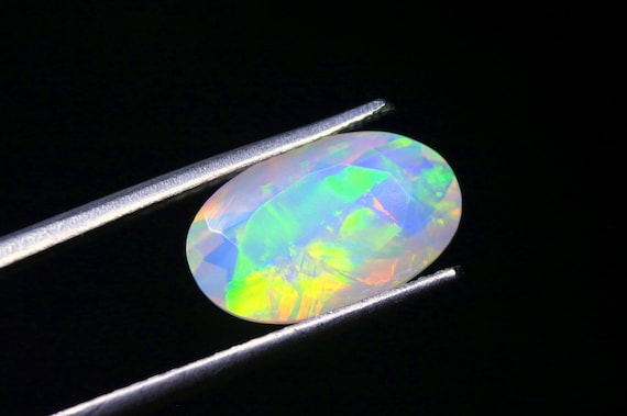 Ethiopian Opal Faceted Gemstone, 1.60 CT Oval Fire Jelly Opal (12x7.40x4.70 MM)