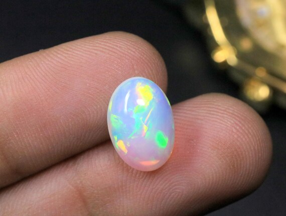 AAA Natural Oval White Opal Loose Gemstone, 2.75 Carat Ethiopian Opal Cabochon For Jewelry