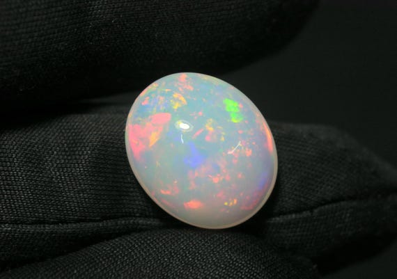 Ethiopian Opal Cabochon: 8.15 CT Oval Multi-Fire Gemstone