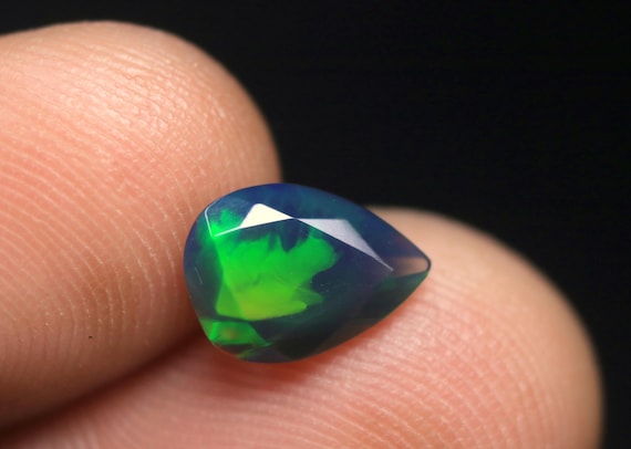Pear Shape Black Opal Faceted Gemstone: 1.00 CT Ethiopian Welo Opal birthstone For Jewelry