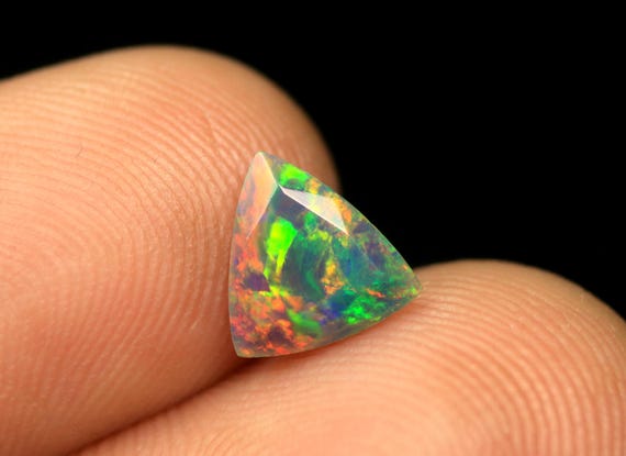 Ethiopian Welo Opal Faceted Gemstone 0.55 Carat AAA Multi Flashy Fire Opal Birthstone