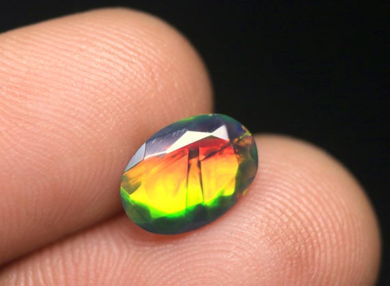Faceted Black Opal Gemstone: 1.05 CT Ethiopian Welo Opal birthstone For Jewelry (10.30x7.30x4 MM)