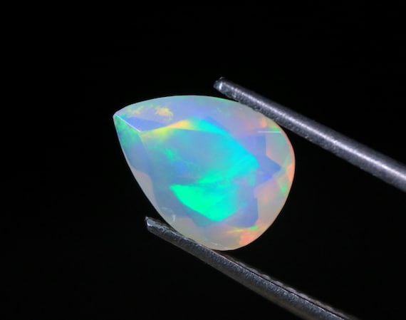 Ethiopian Welo Opal Gemstone: 1.50 CT Pear Cut Galaxy Fire Opal