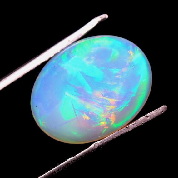 Natural Ethiopian Opal Gemstone, Oval Welo Fire Opal Cabochon (4.70 CT)