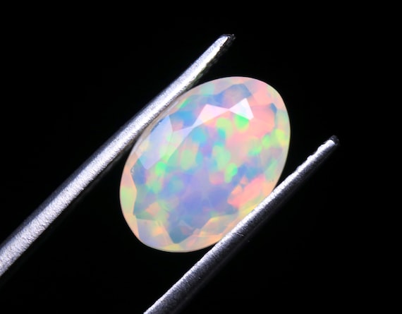 Faceted Ethiopian Welo Opal Gemstone: 1.50 CT Oval White Opal Jewelry Stone