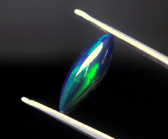 Ethiopian Black Opal Marquise Cabochon: 1.70 CT Rainbow Welo Opal