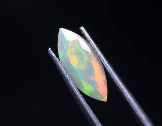 Faceted Ethiopian Welo Opal Gemstone: 0.80 CT Marquise Galaxy Fire Opal Loose Stone