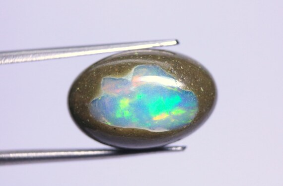 Ethiopian Welo Opal Cabochon: 7.40 Carat Multi Fire Boulder Opal Loose Gemstone For Jewelry
