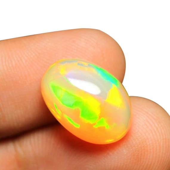 Natural Welo Opal Cabochon: AAA Grade Ethiopian Gemstone (7.15 CT, 16.40x11.50x7.20 MM)