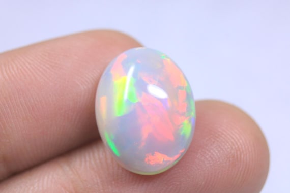 AAA Quality Oval Opal Cabochon: 8.40 Carat Natural Galaxy Fire Ethiopian Opal Jewelry Stone
