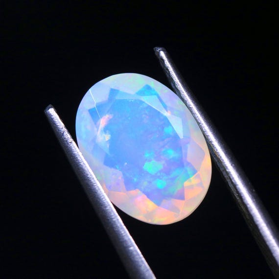 Faceted Ethiopian Opal Gemstone: 1.80 CT Oval Fire Jelly Opal