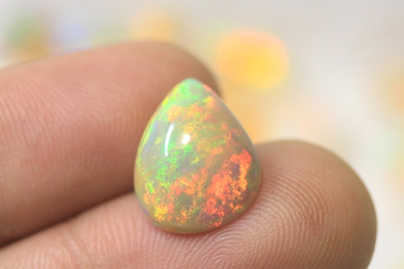 Natural Ethiopian Opal Pear Cabochon: 4.05 CT Multi Flashy Fire Opal Loose Gemstone