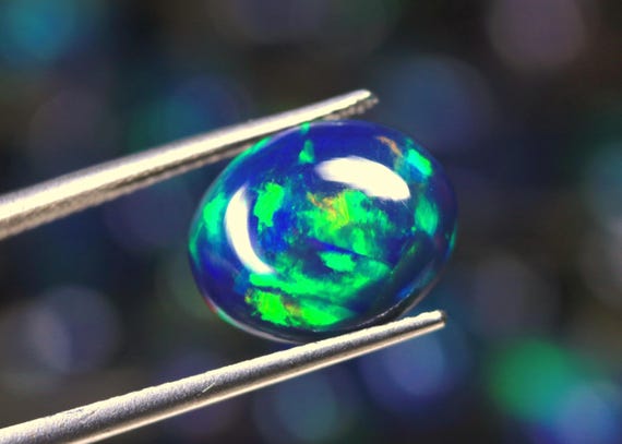 2.95 CT Ethiopian Opal Cabochon: Black Fire Gemstone, October Birthstone