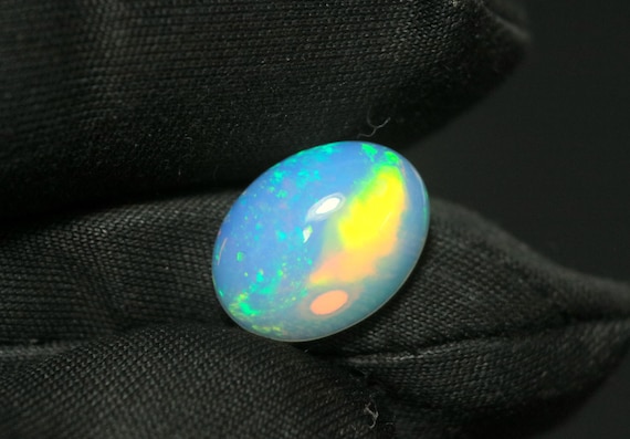 Ethiopian Opal Cabochon: 3.15 CT Oval Fire Opal, AAA Grade, 13x10mm