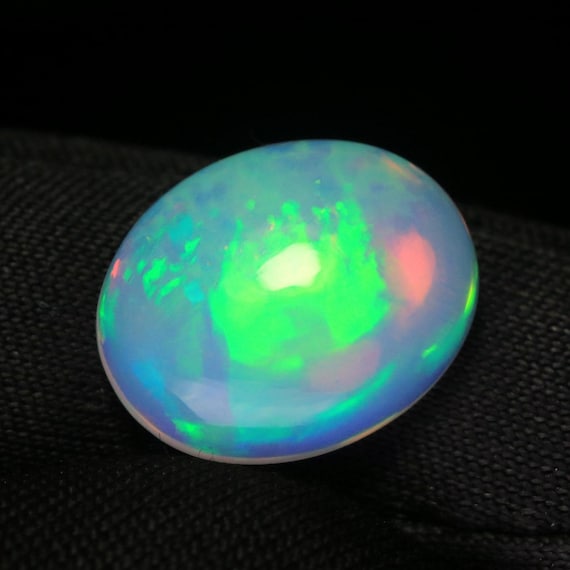 Ethiopian Opal Cabochon: 2.50 CT Oval Jelly Gemstone, 12x10x4 mm
