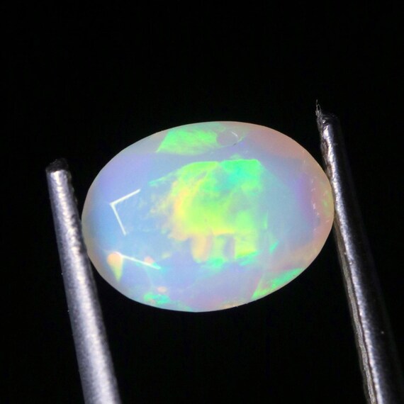 Natural Ethiopian Opal Gemstone: Oval Shape, 0.80 CT Multi Fire Welo Loose Stone