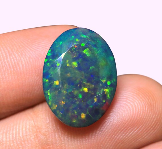7.10 CT Faceted Ethiopian Black Opal Gemstone, Oval Welo Opal Loose Stone (18.60x14x7.50 MM)