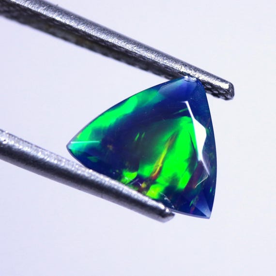 Ethiopian Opal Gemstone: 0.75 CT Trillion Cut, Colorful Fire