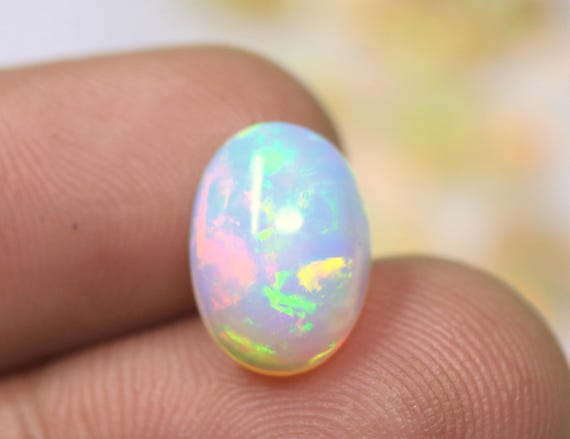 AAA+ Quality Natural Fire Opal Cabochon, 3.25 Carat Oval Ethiopian Opal Gemstone For Jewelry