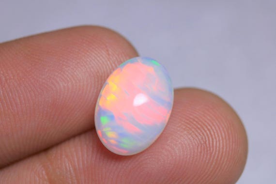 AAA Welo Opal Cabochon: 2.80 CT Oval Ethiopian Fire Opal