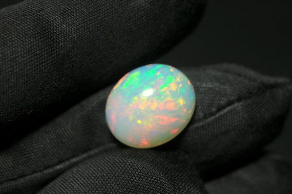 Ethiopian Welo Opal Cabochon: 6.60 CT Oval Multi-Fire Gemstone
