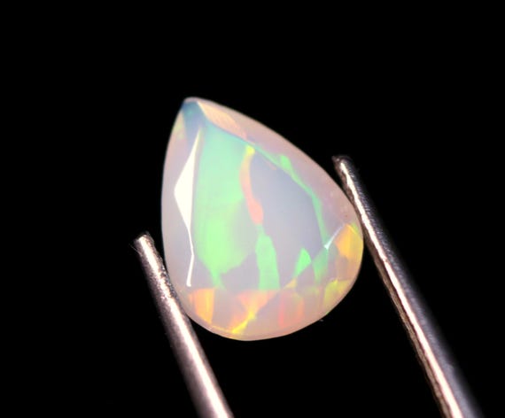 Ethiopian Opal Gemstone: 1.20 CT Pear Shape Rainbow Welo Opal