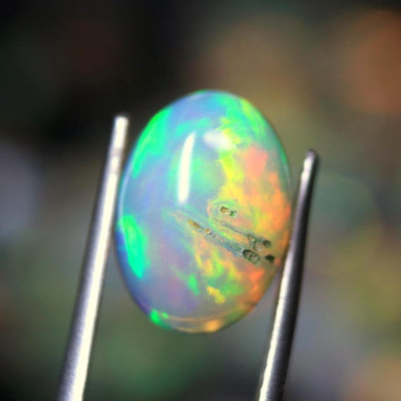 AAA Ethiopian Welo Opal Cabochon: 3.10 CT Oval Gemstone, October Birthstone