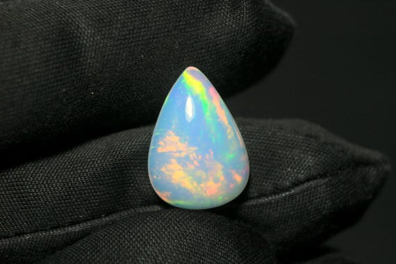 AAA Welo Opal Cabochon: 4.60 CT Pear Ethiopian Fire Opal